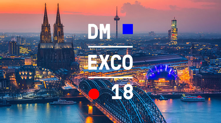 And image of a city at night with the dmexco logo over it