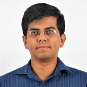 Professional headshot of Dinesh Kandhari