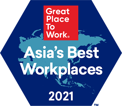 A light blue silhouette of Asia is placed on top of a dark blue hexagon with a red square that has the text " Great Place To Work" in white within it. The text " Asia's Best Workplaces 2021"