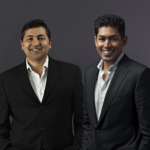 Professional group shot of Rajeev and Amar Goel