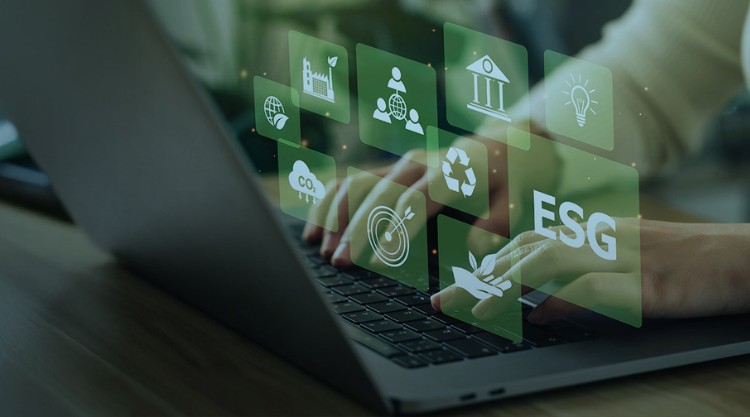 Woman using a laptop to trade carbon credit on a virtual screen